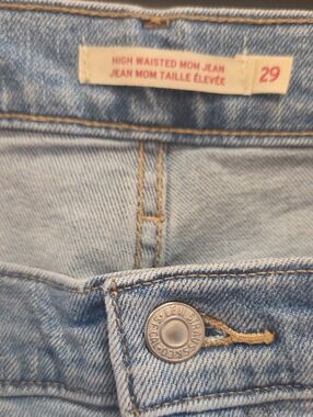 Levi's Light Blue Denim Jeans with Tan Leather Patch